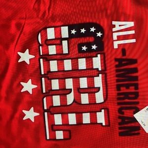 Features a classic crew neck shirt